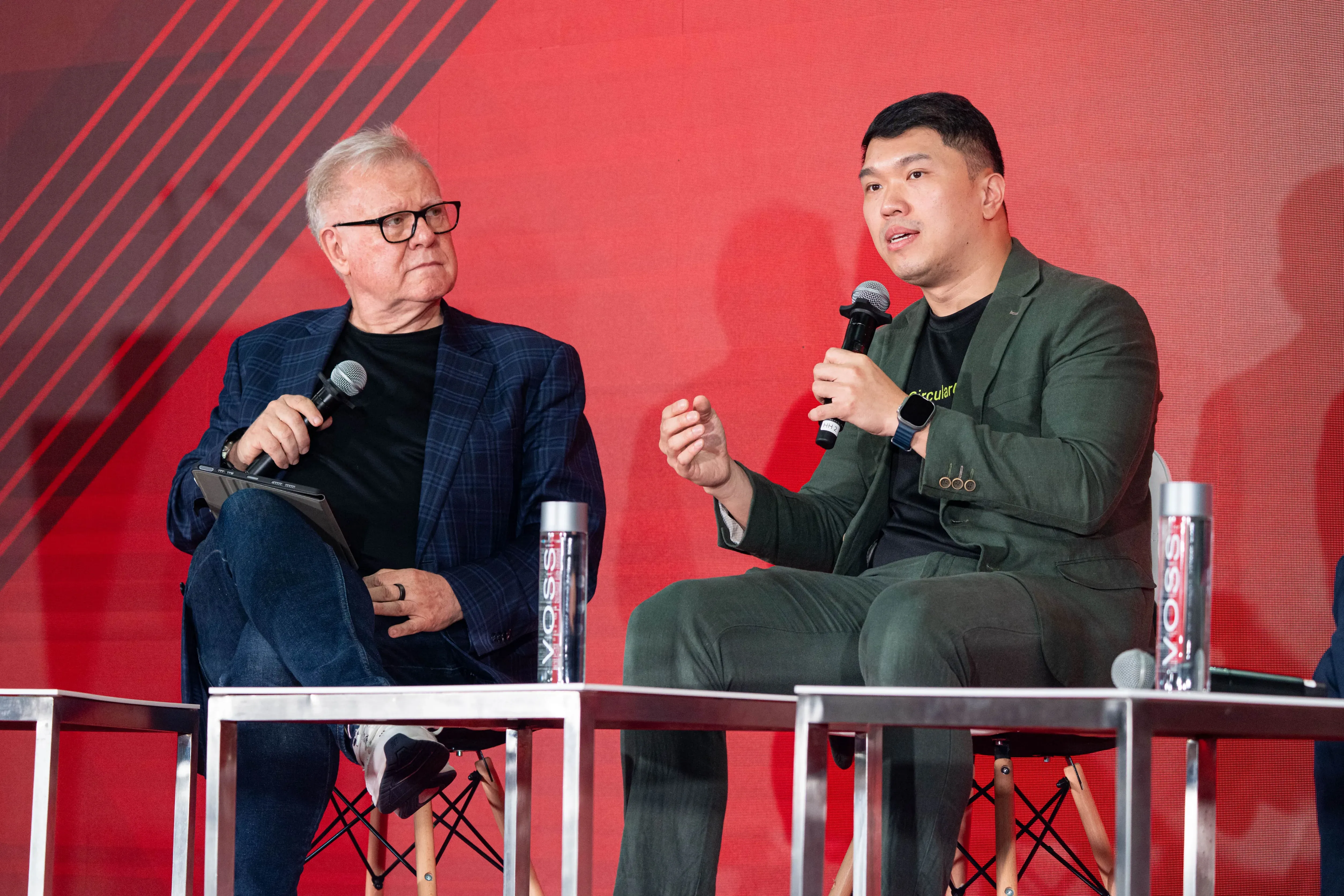 Panelists speaking at Converge